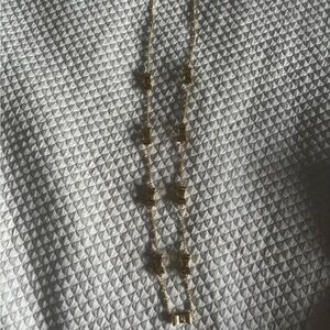 KATE SPADE Gold Tone Gold Enamel Bow Long Necklace